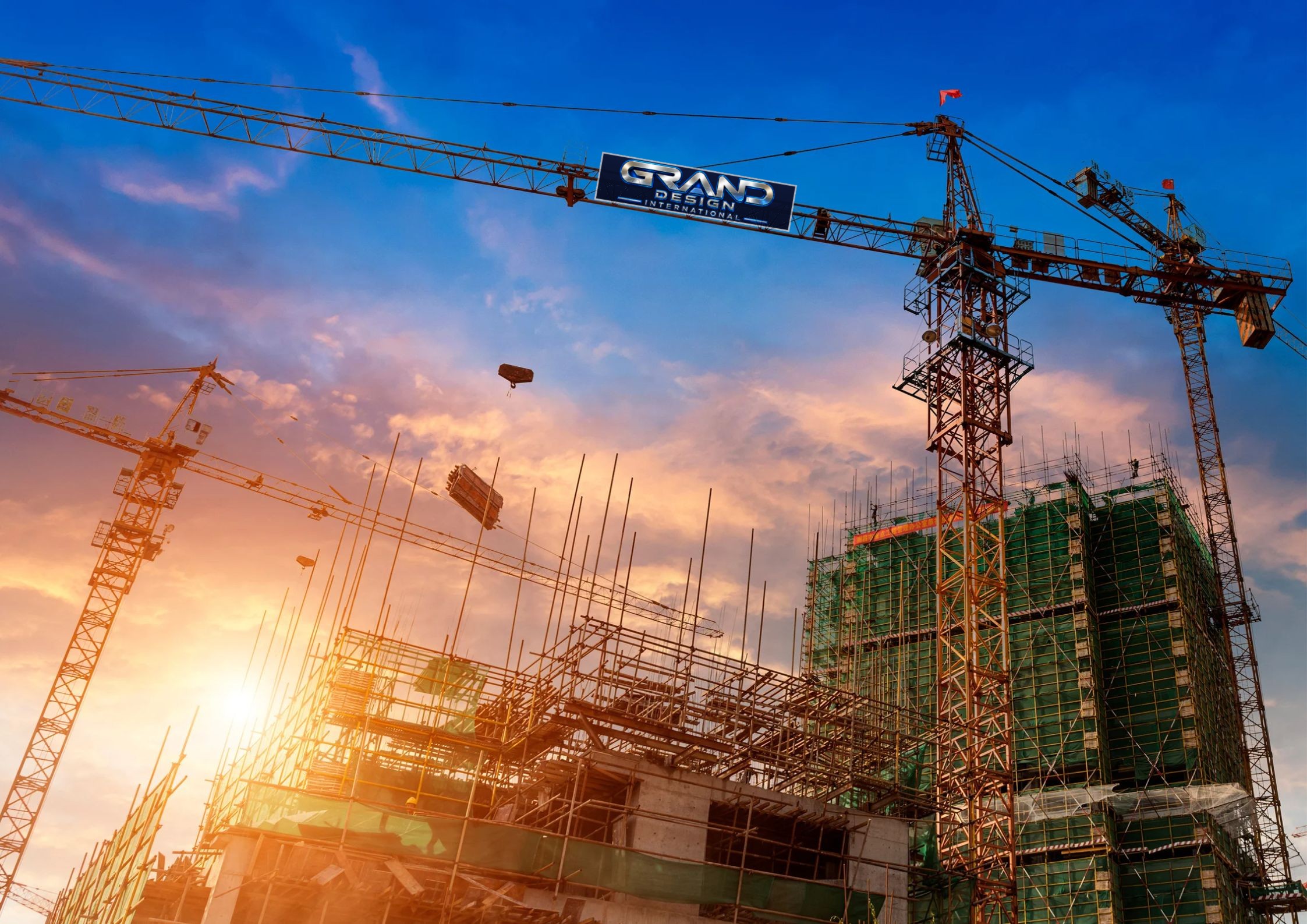 Construction site tower crane carrying a Grand Designs International jib banner